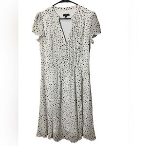 JBS Midi dress. Peasant style top with button detail.